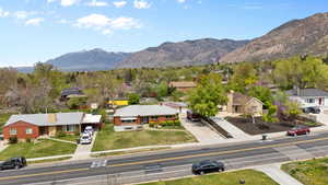 Aerial view featuring a mountain view and a residential view
