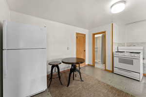 Kitchen with white appliances