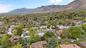 Drone / aerial view with a residential view and a mountain view