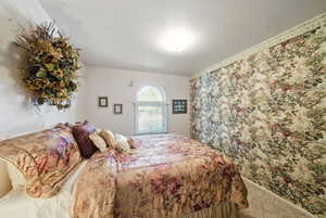 Bedroom with carpet