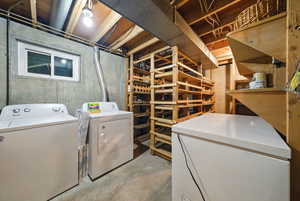 Laundry area with washer and dryer and laundry area