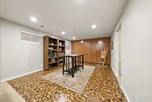 Home office featuring visible vents, baseboards, and recessed lighting