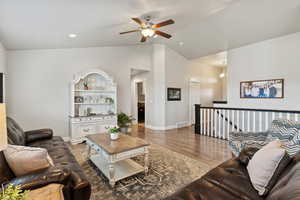 Living room with LVP floors and ceiling fan