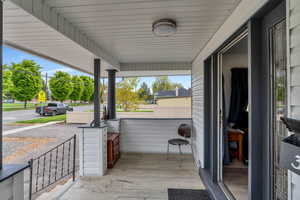 View of patio with a porch