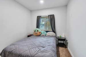 Bedroom with carpet and recessed lighting