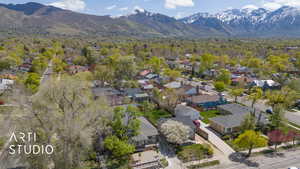 Aerial view featuring a mountain view and a residential view