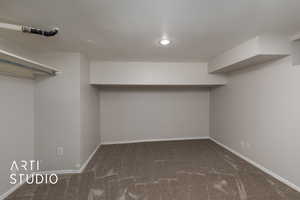 Walk in closet with carpet