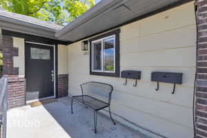 Property entrance with brick siding