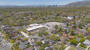 Birds eye view of property with a mountain view