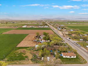 Drone / aerial view featuring a rural view and a mountain view