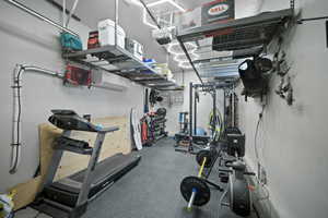Exercise room with a garage