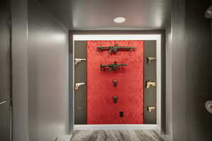 Doorway to outside featuring baseboards