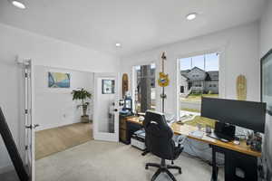 Office area featuring french doors, wood finished floors, and recessed lighting