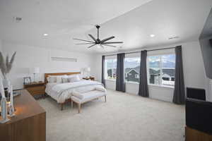 Bedroom featuring vaulted ceiling, visible vents, recessed lighting, light colored carpet, and ceiling fan