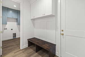 Mudroom with recessed lighting, wood finished floors, and baseboards