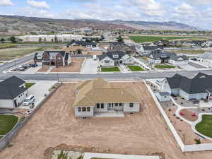 Bird's eye view featuring a mountain view and a residential view