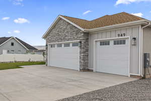 Garage featuring driveway