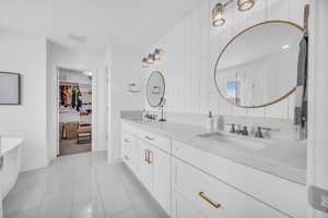 Master bathroom, double vanities, separate soaking tub & walkin shower. Substantial custom upgrades.