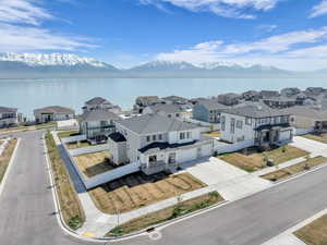 Aerial view with a water and mountain view and a residential view