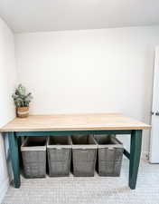 Laundry room with custom built in cabinets & folding space.