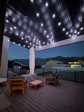 Deck featuring outdoor lounge area and a mountain view