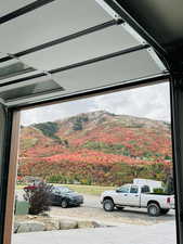 Garage featuring a mountain view