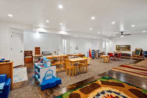 Recreation room featuring recessed lighting and ceiling fan