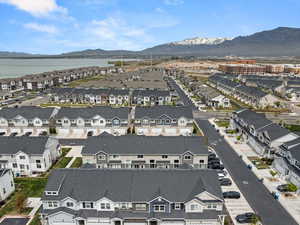 Bird's eye view with a water and mountain view and a residential view
