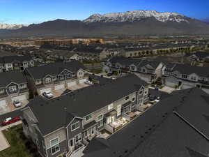 Birds eye view of property featuring a residential view and a mountain view