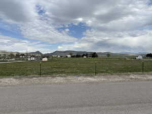 View of road featuring a mountain view and a rural view