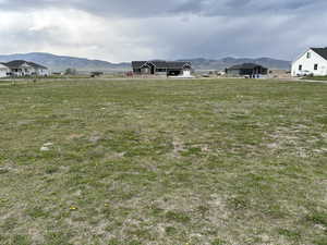 View of yard with a mountain view