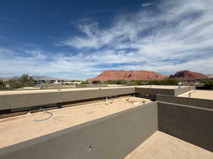 Patio / terrace featuring a mountain view