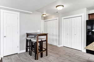 Dining space with baseboards and visible vents