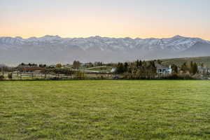 Property view of mountains with a rural view