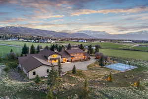 Birds eye view of property featuring a rural view and a mountain view