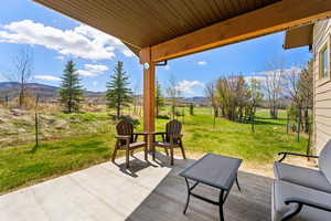 View of patio / terrace with a mountain view