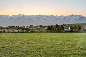 Property view of mountains featuring a rural view