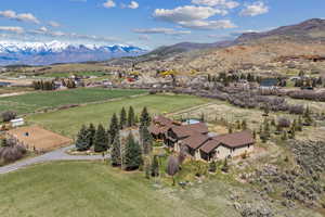 Drone / aerial view featuring a rural view and a mountain view