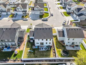 Birds eye view of property with a residential view