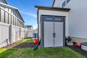 Exterior space with a gate and fence