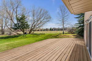 Wooden deck with a yard