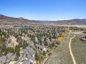 Bird's eye view featuring a water and mountain view