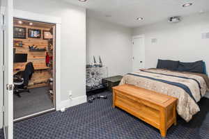 Media room with in-wall speakers with baseboards