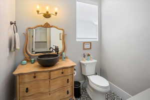 Bathroom featuring toilet and vanity