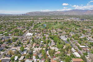 Drone / aerial view with a residential view and a water and mountain view