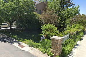 View of side of home with a chimney