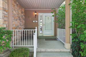 Property entrance with a porch