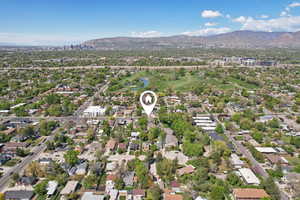 Birds eye view of property with a residential view and a water and mountain view