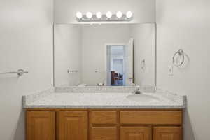 Bathroom with vanity and toilet
