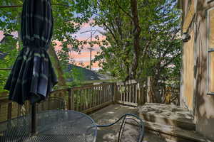 Deck at dusk featuring outdoor space